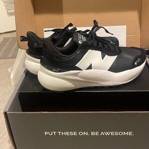 New Balance Black and White Athletic Shoes